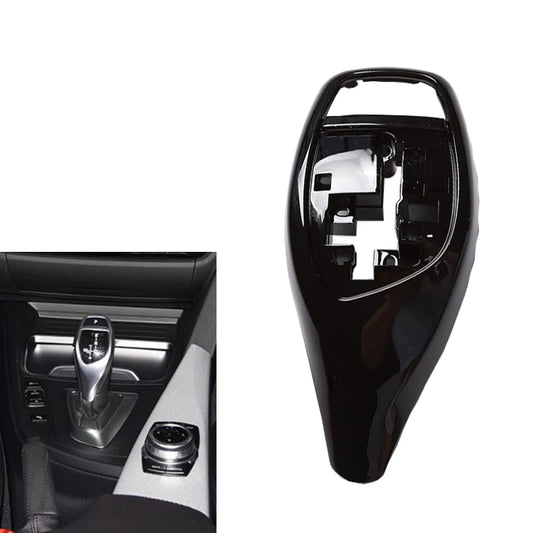 Car gear shift lever with a close-up of the gear shift area on a white background